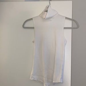 White sleeveless turtleneck